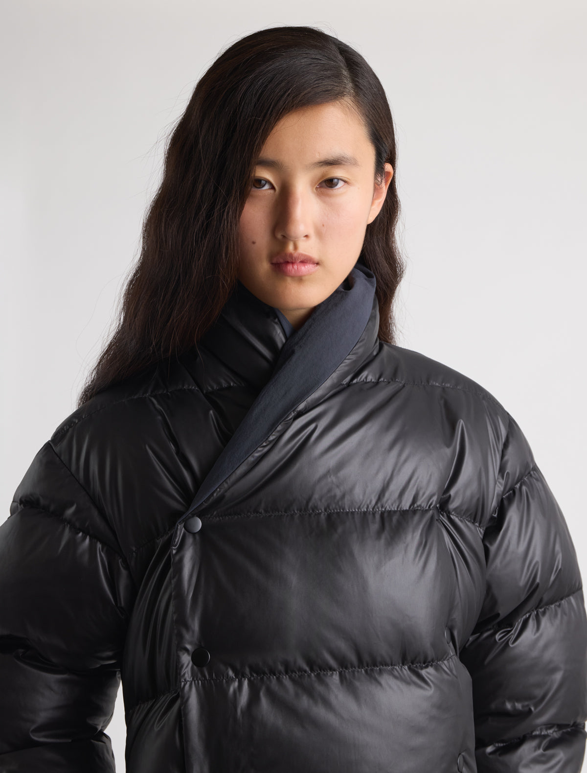 Alkaline reversible puffer jacket double breasted snap button voluminous sleeves black