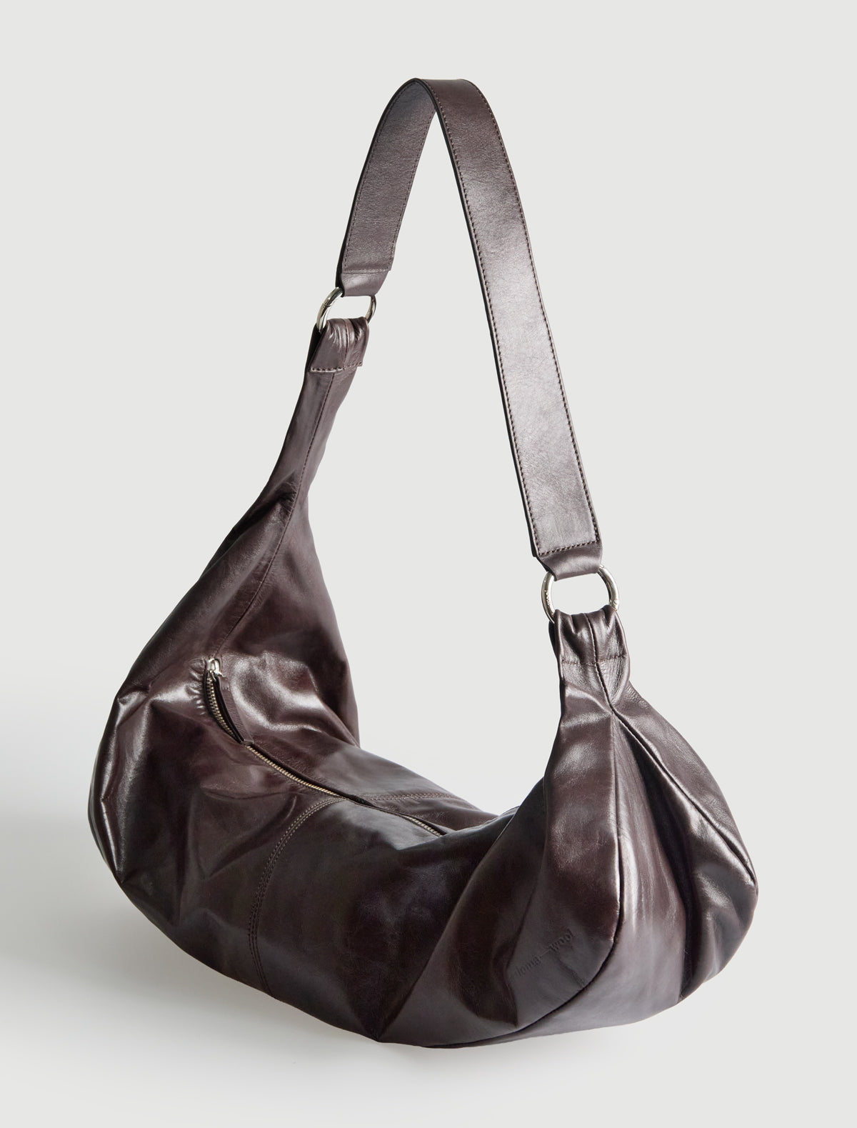 Dry elongated wrap around hobo style shoulder bag darkbrown