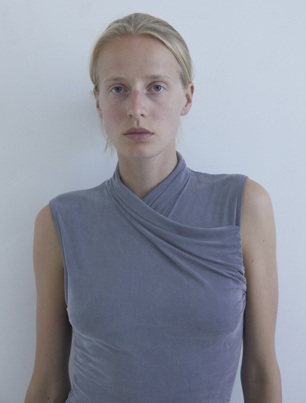 Such sleeveless cupro top draped crossed neckline greyishblue