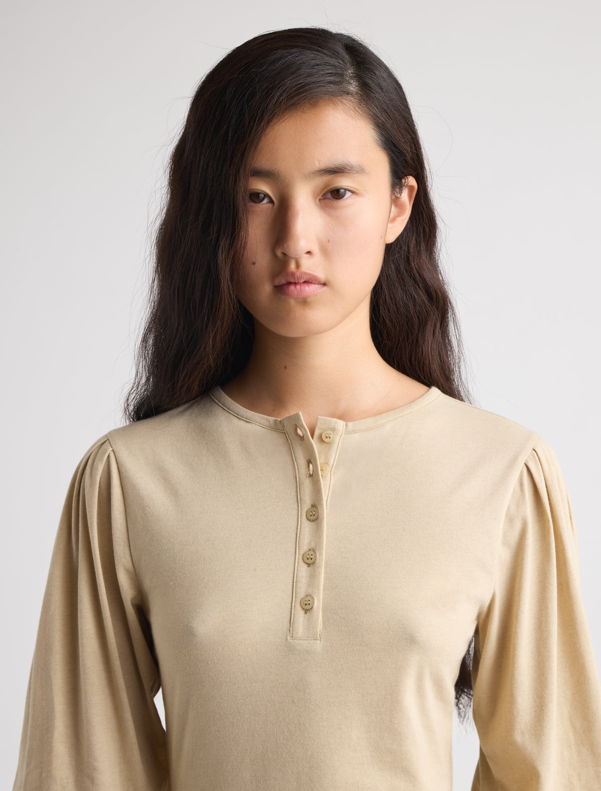Rafaga top henley style neckline puff sleeves fitted hem beige