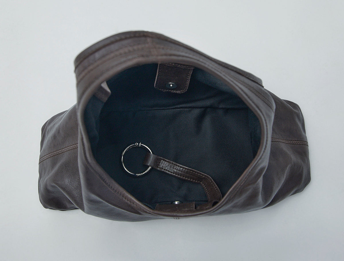 Querida triangular shaped handbag handle new brown