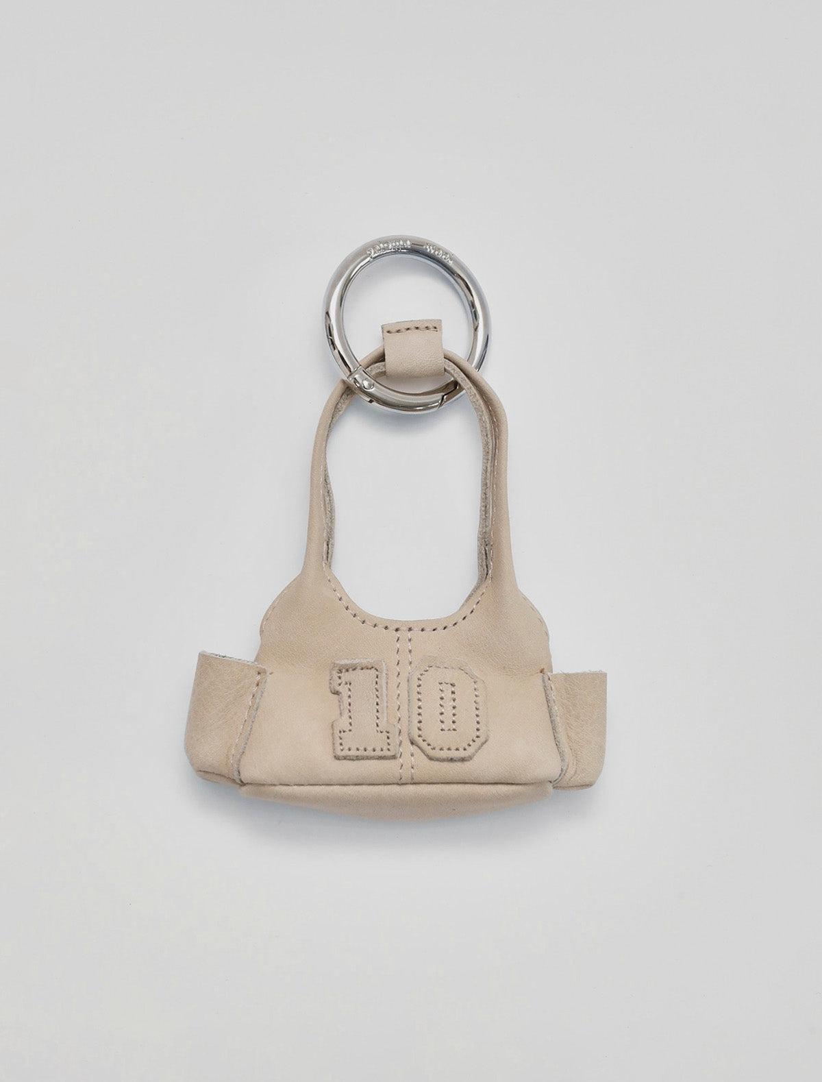 10 years miniature leather charm beige