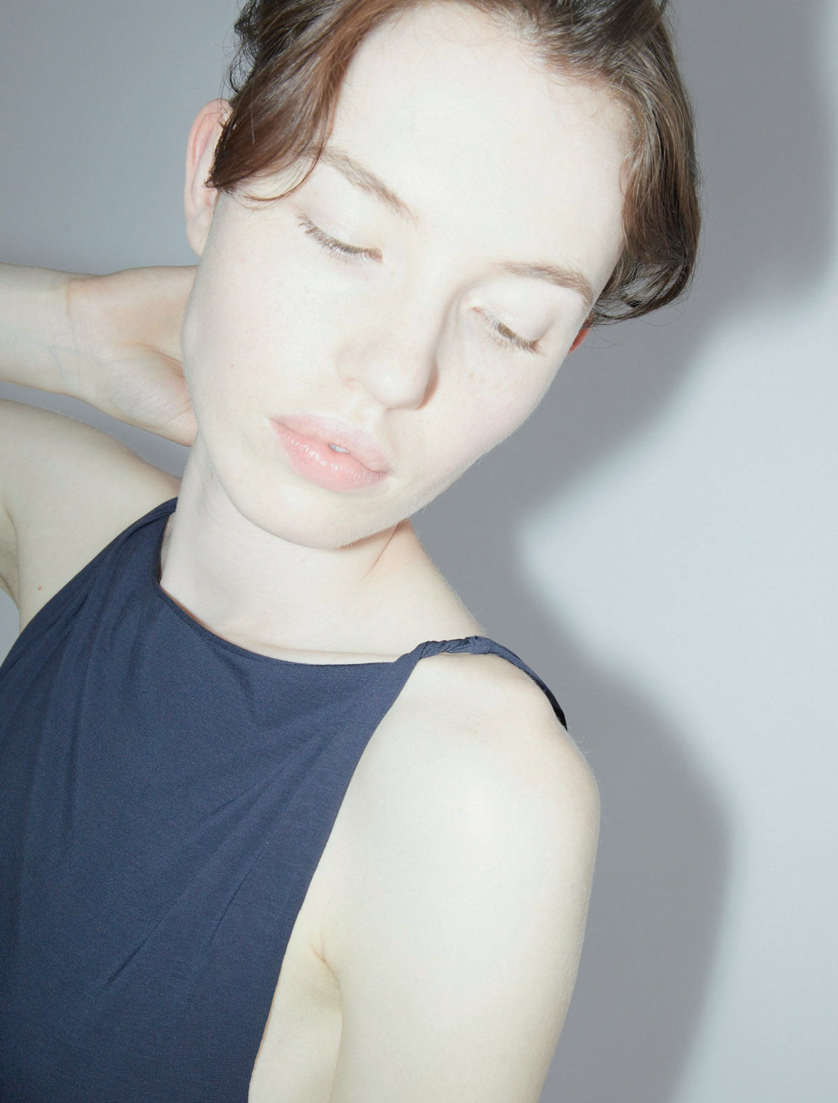 Simp sleeveless top twisted shoulder details navy