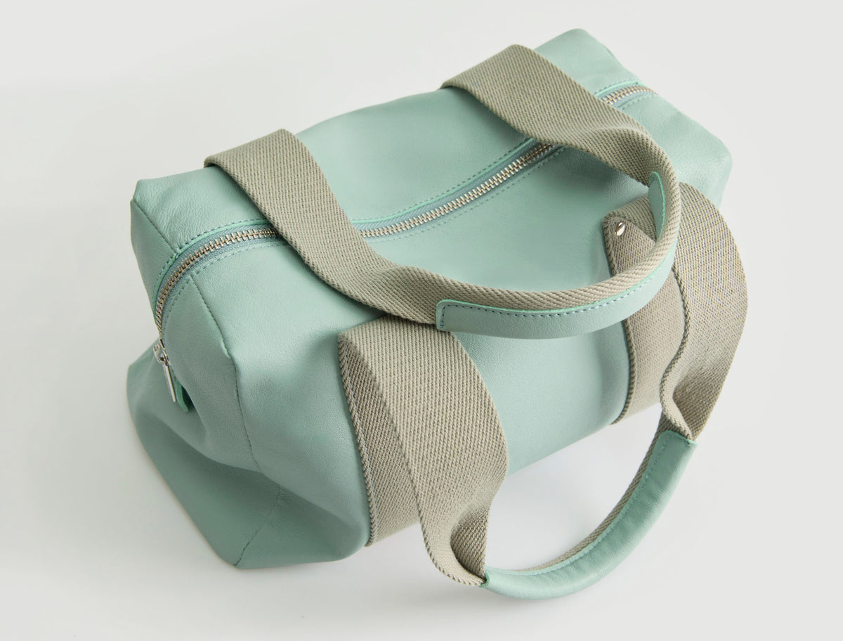Small eira bag leather shoulder bag contrasting woven handles blue