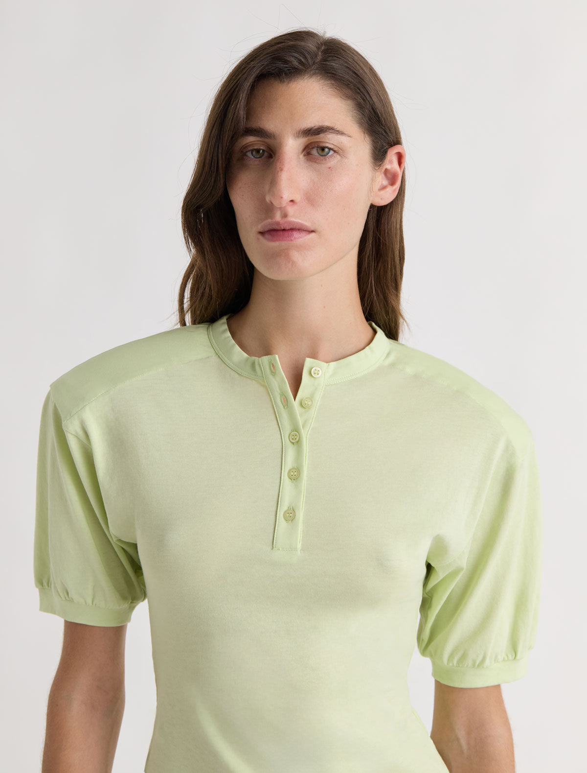 Renfo short sleeved top henley neckline raglan sleeves removable shoulder pads fluor